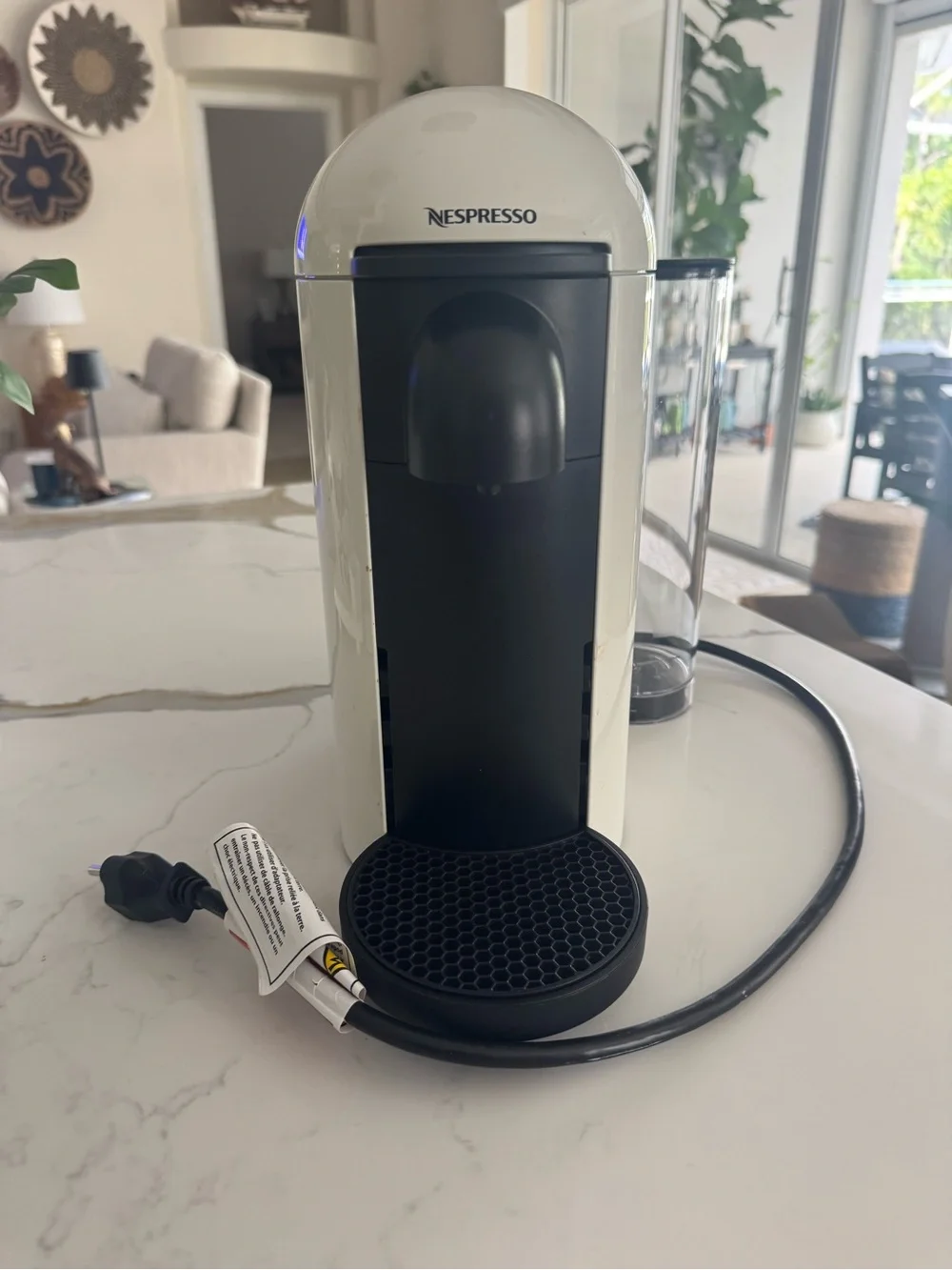 Nespresso Vertuo Plus Machine in White and Black. Used a few months.